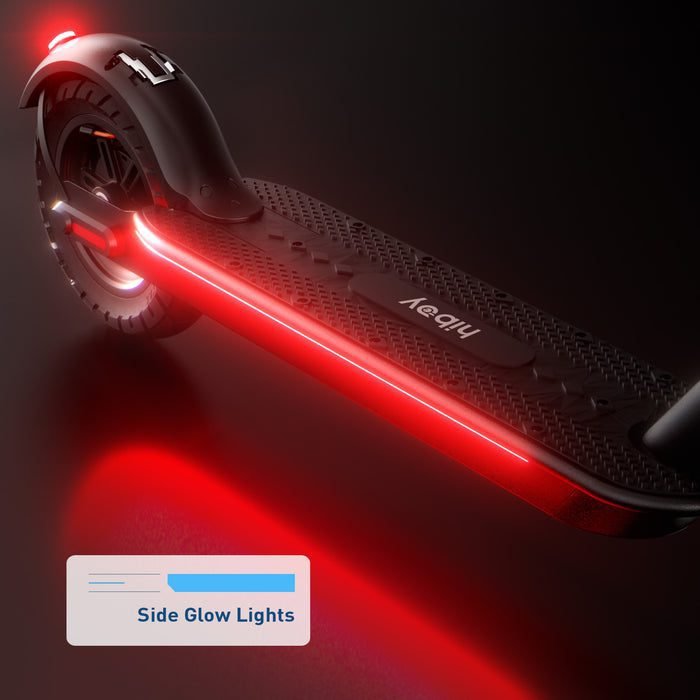 Electric scooter with red side glow lights on a dark background