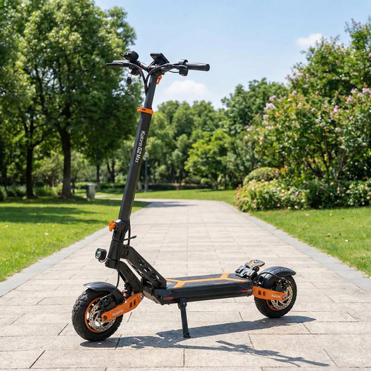 Electric scooter on a paved path in a park with trees and flowers in the background