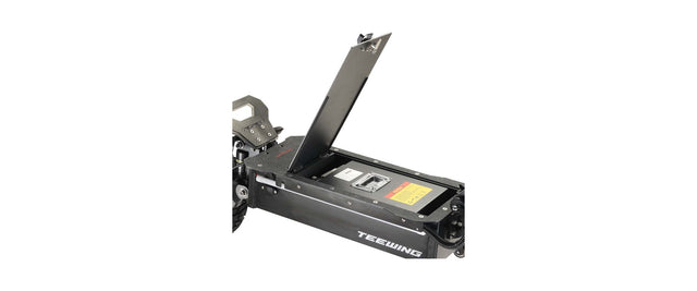 Removable lithium battery lifted out of a Teewing Z4 Pro electric scooter deck