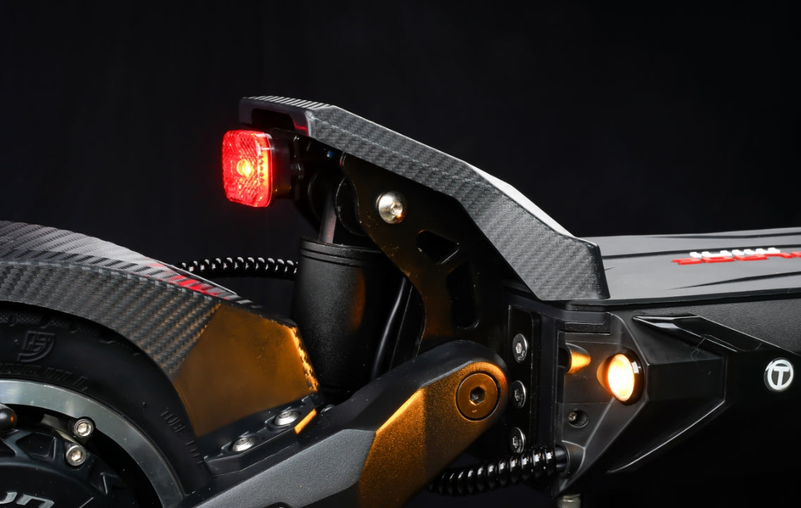 Teverun Blade Mini Pro electric scooter in black and yellow with dual 800W motors, 31 mph top speed, 95 km range, and tubeless 10x3 inch tires