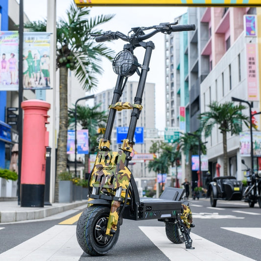 Black and yellow electric scooter on a city street with buildings and palm trees in the background.