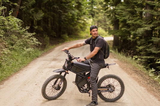 Riding’times GT73 Pro electric motorbike ridden along a forest gravel road