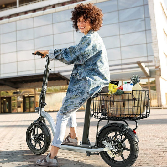 Woman riding a scooter with a basket full of groceries in an urban setting