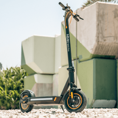 Electric scooter with 'hiboy' branding on a textured surface with a blurred background