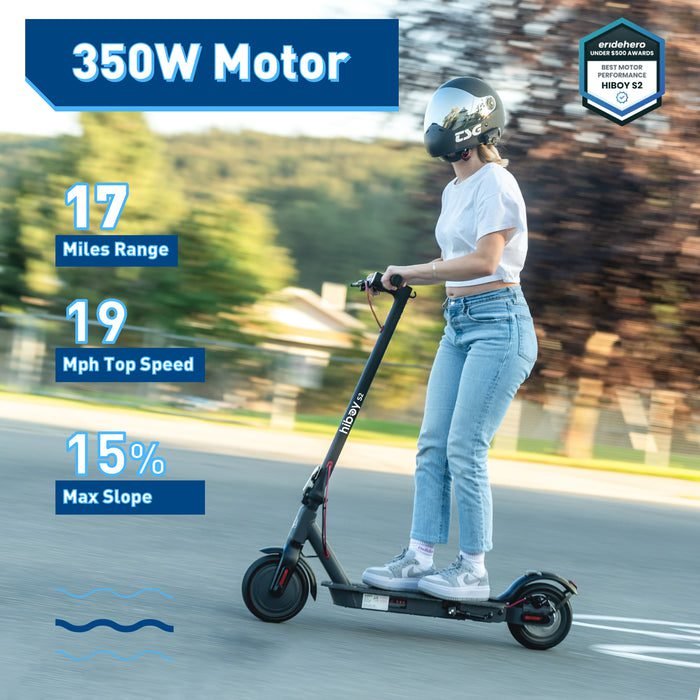 Person riding an electric scooter with performance specifications displayed on a blurred outdoor background