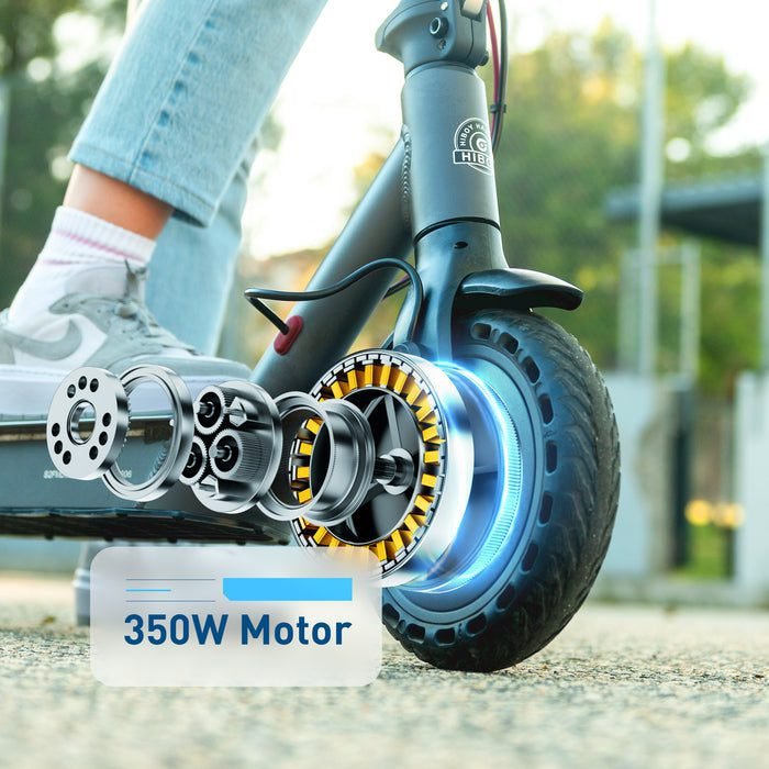 Close-up of an electric scooter wheel with a 350W motor label, blurred background