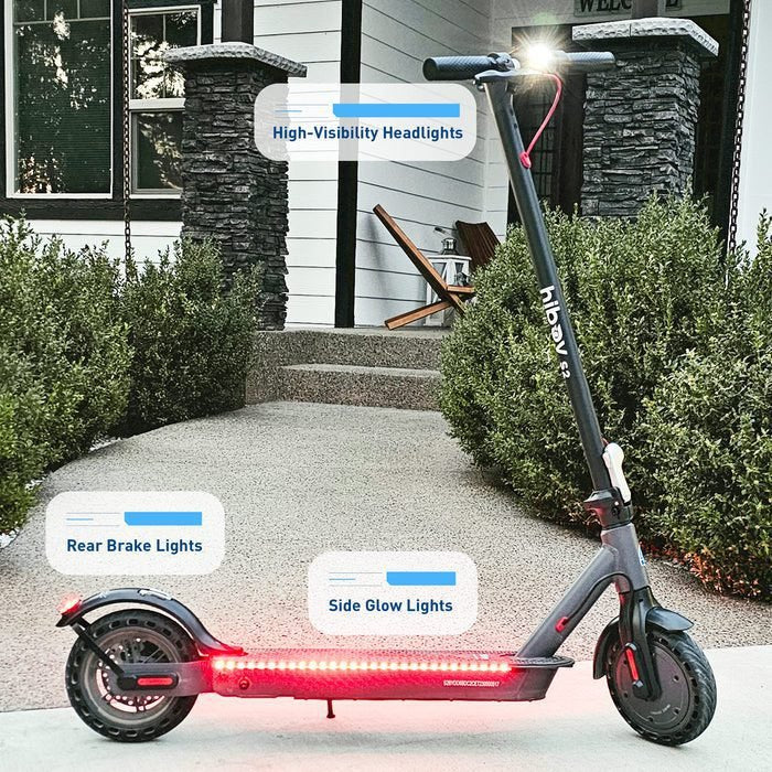 Electric scooter with highlighted safety features in a residential setting