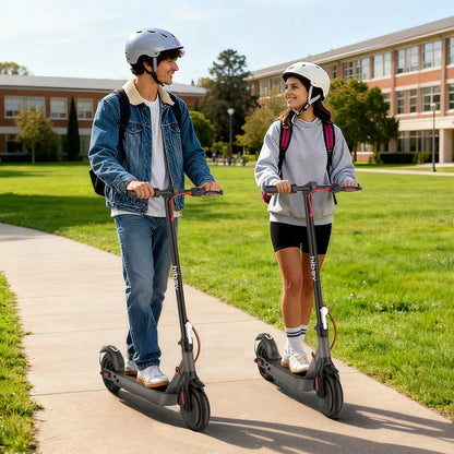 Two people riding electric scooters on a sidewalk with a school building in the background.