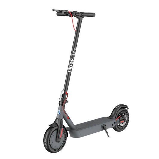 Gray electric scooter with black wheels on a white background