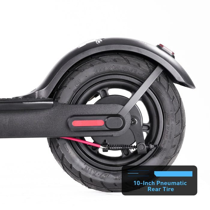 Close-up of a 10-inch pneumatic rear tire on a scooter with a white background.