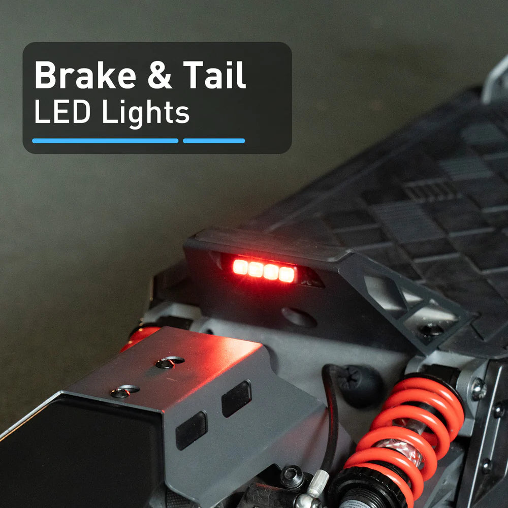 Close-up of brake and tail LED lights on a vehicle with text overlay.