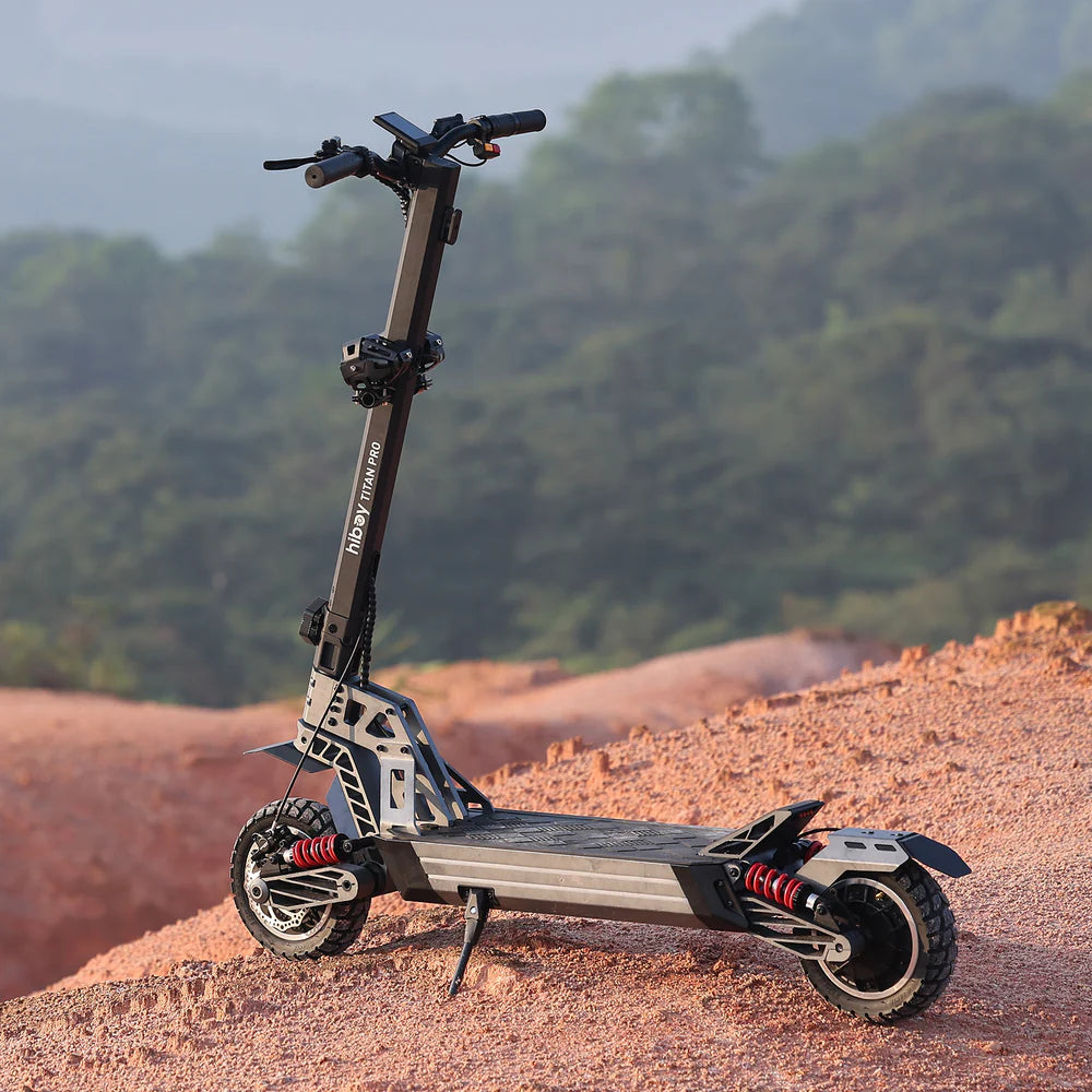 Electric scooter on a dirt path with a forest background