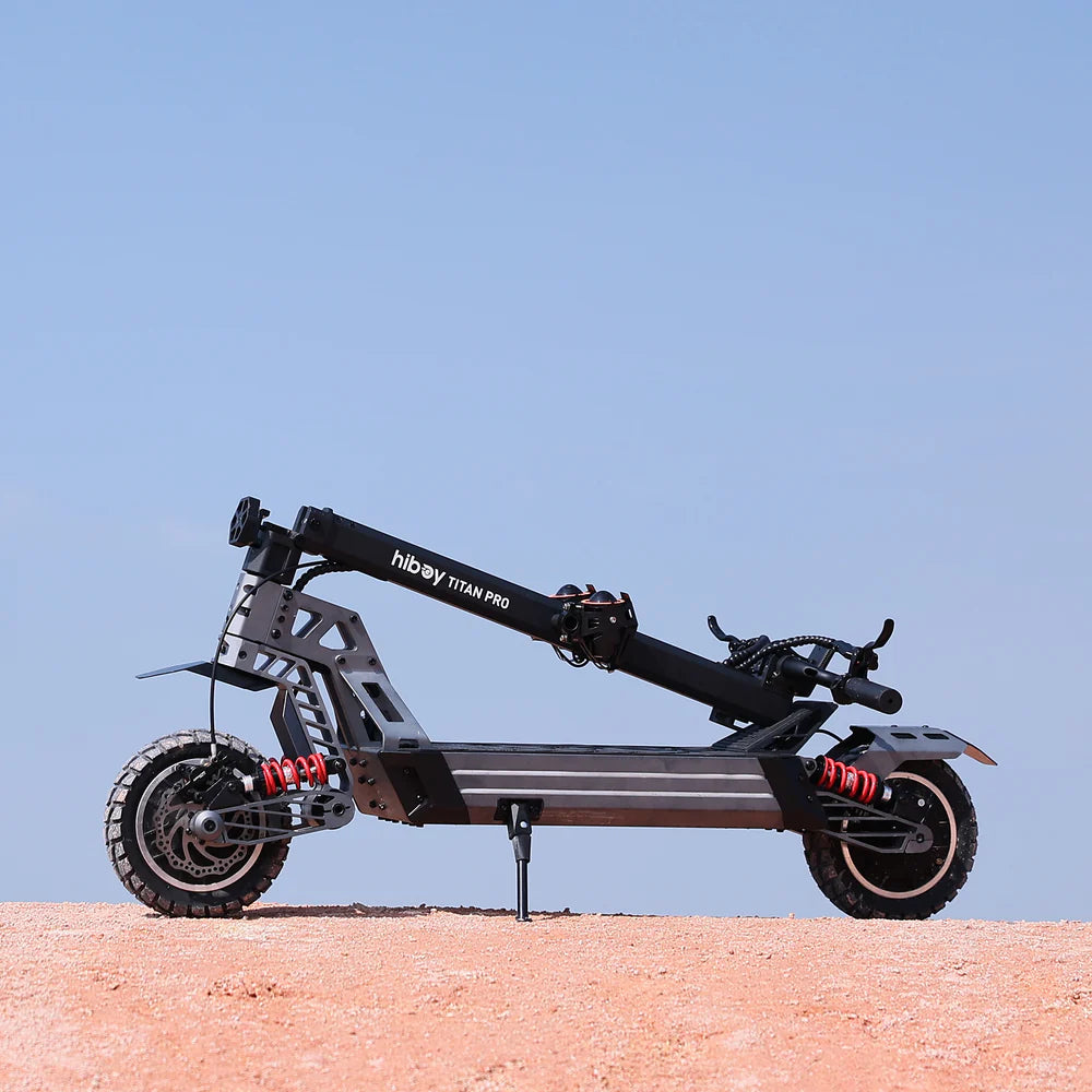 Black electric scooter with 'hiboy' branding on a clear blue sky background