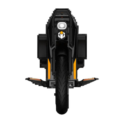 Back view of a black and orange electric bike on a white background