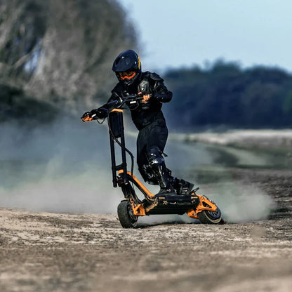 Person riding an electric scooter on a dirt path with a blurred natural background