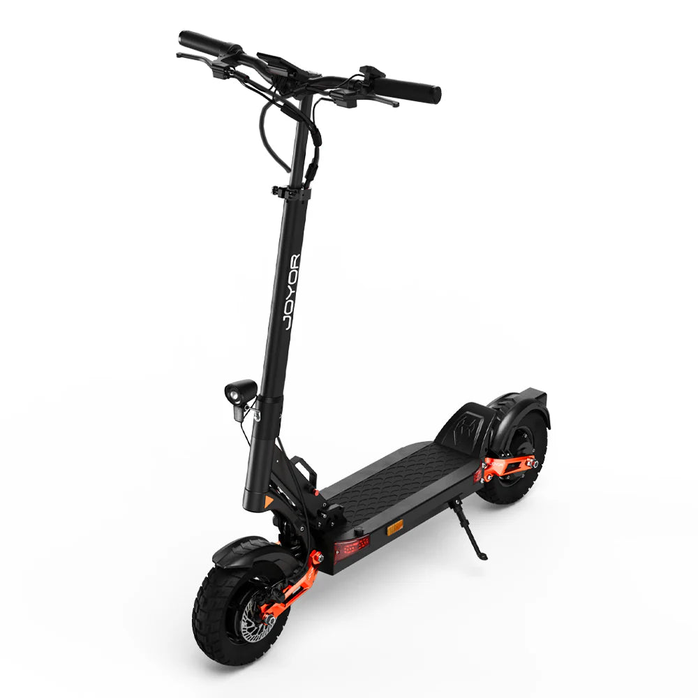 Black electric scooter with orange accents on a white background