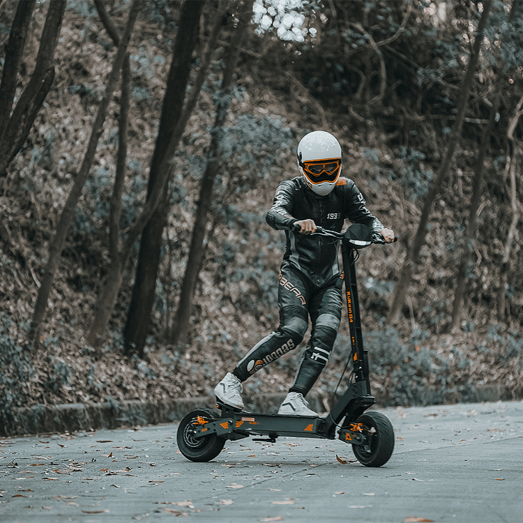 Person riding an electric scooter in a forested area