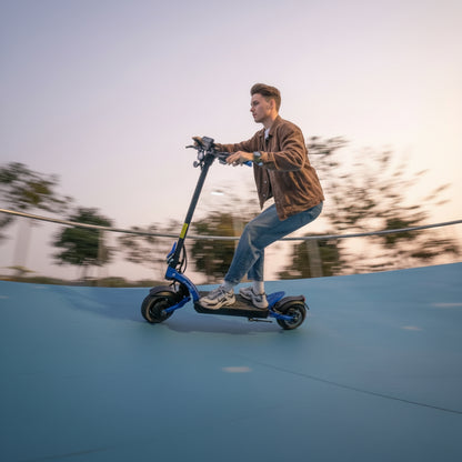 Person riding an electric scooter on a blue surface with trees in the background