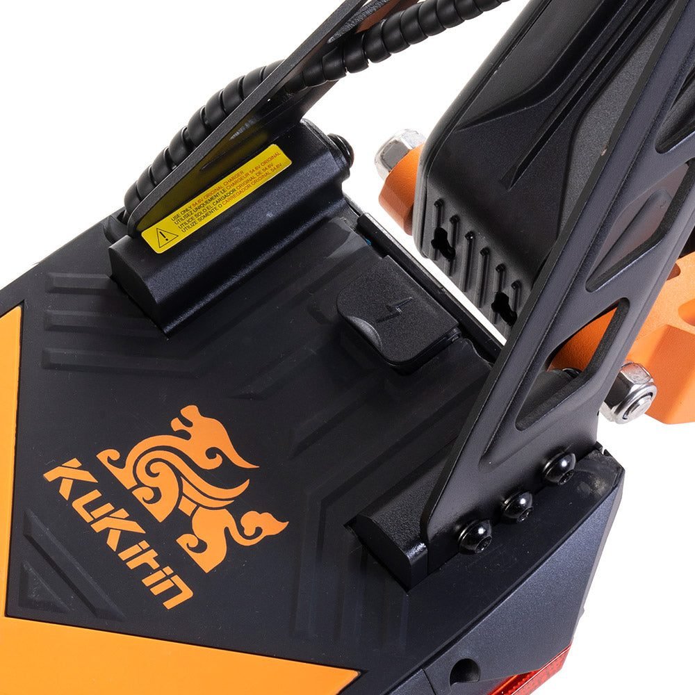 Close-up of a power tool with Kukirin branding on a white background