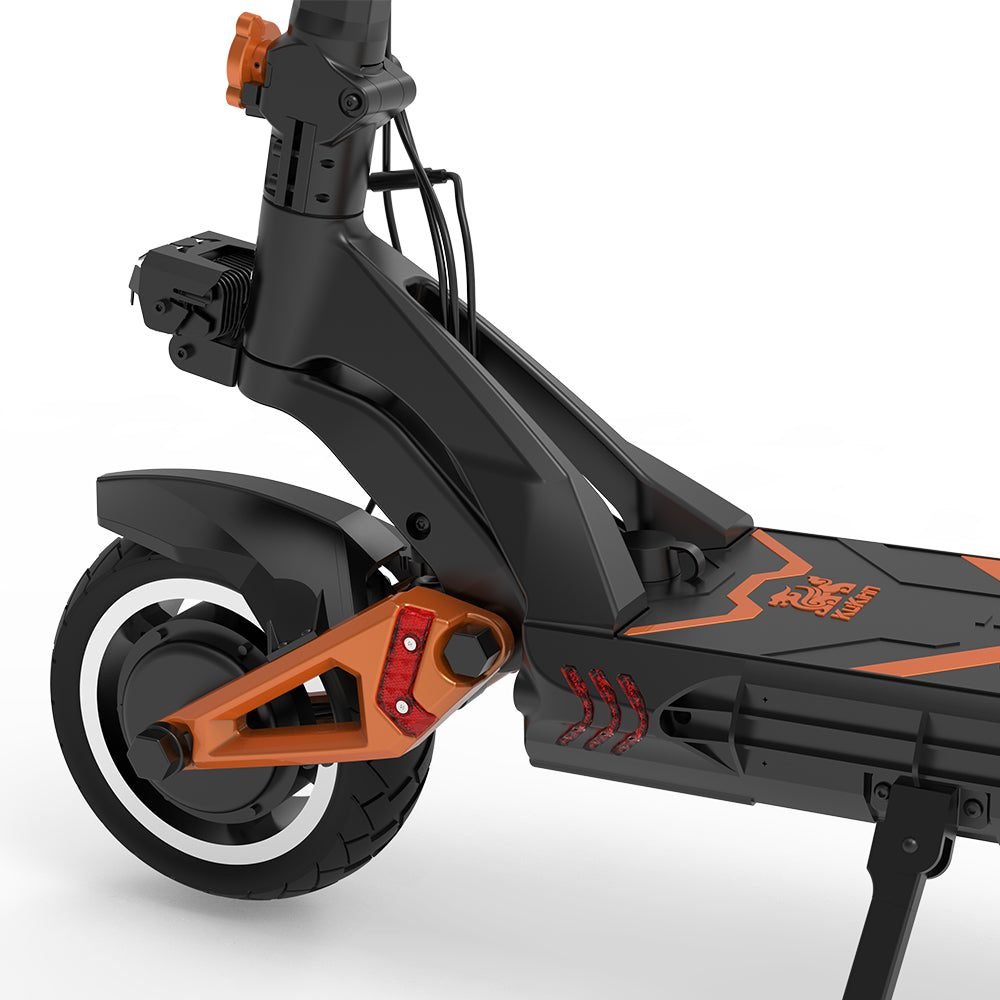 Close-up of a black and orange electric scooter on a white background