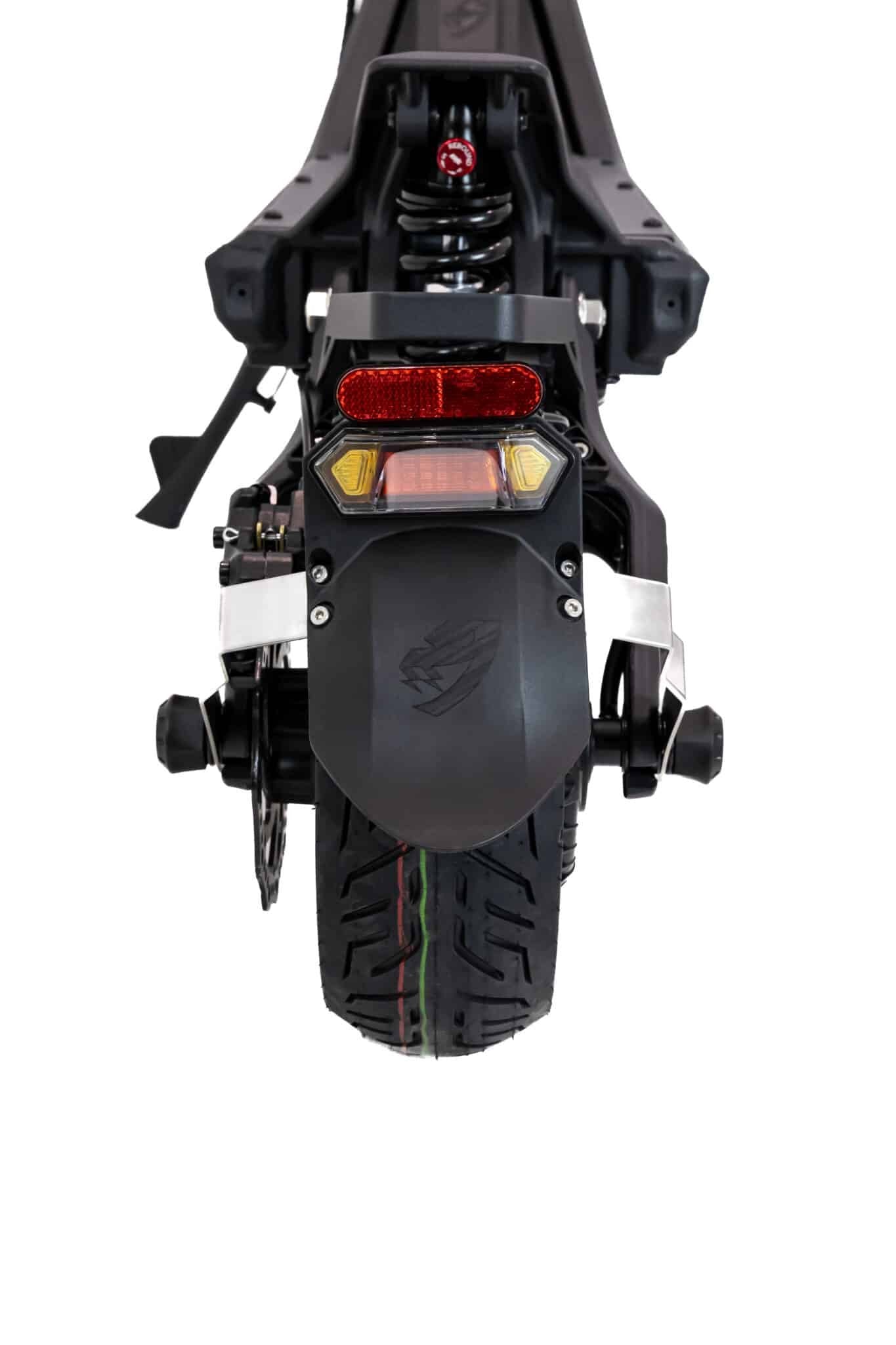 Close-up of a motorcycle's rear section with visible branding on a white background