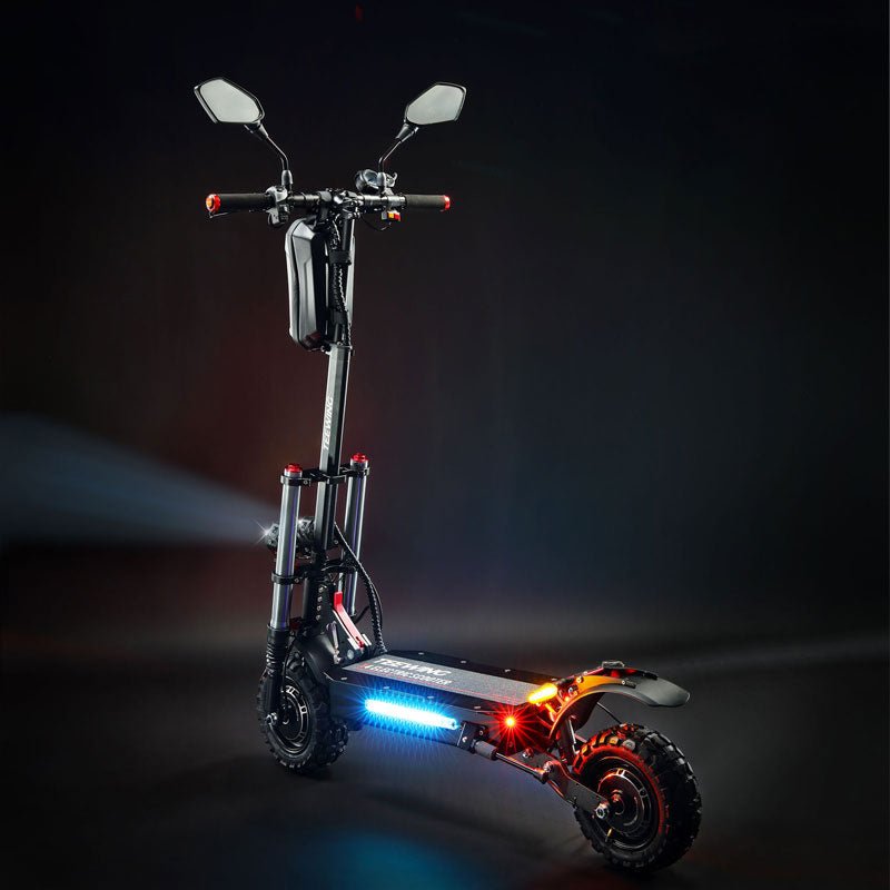 Teewing X4 electric scooter lit at night with deck LEDs on