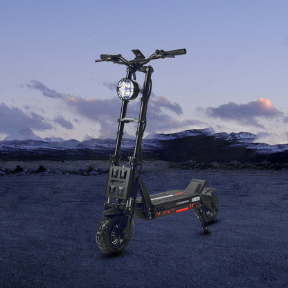 Electric scooter in a desert landscape with mountains in the background