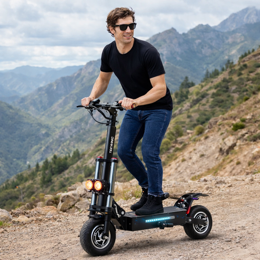 Man riding an electric scooter in a mountainous landscape