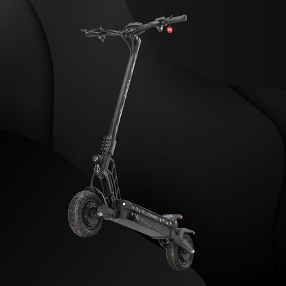 Black electric scooter on a dark background