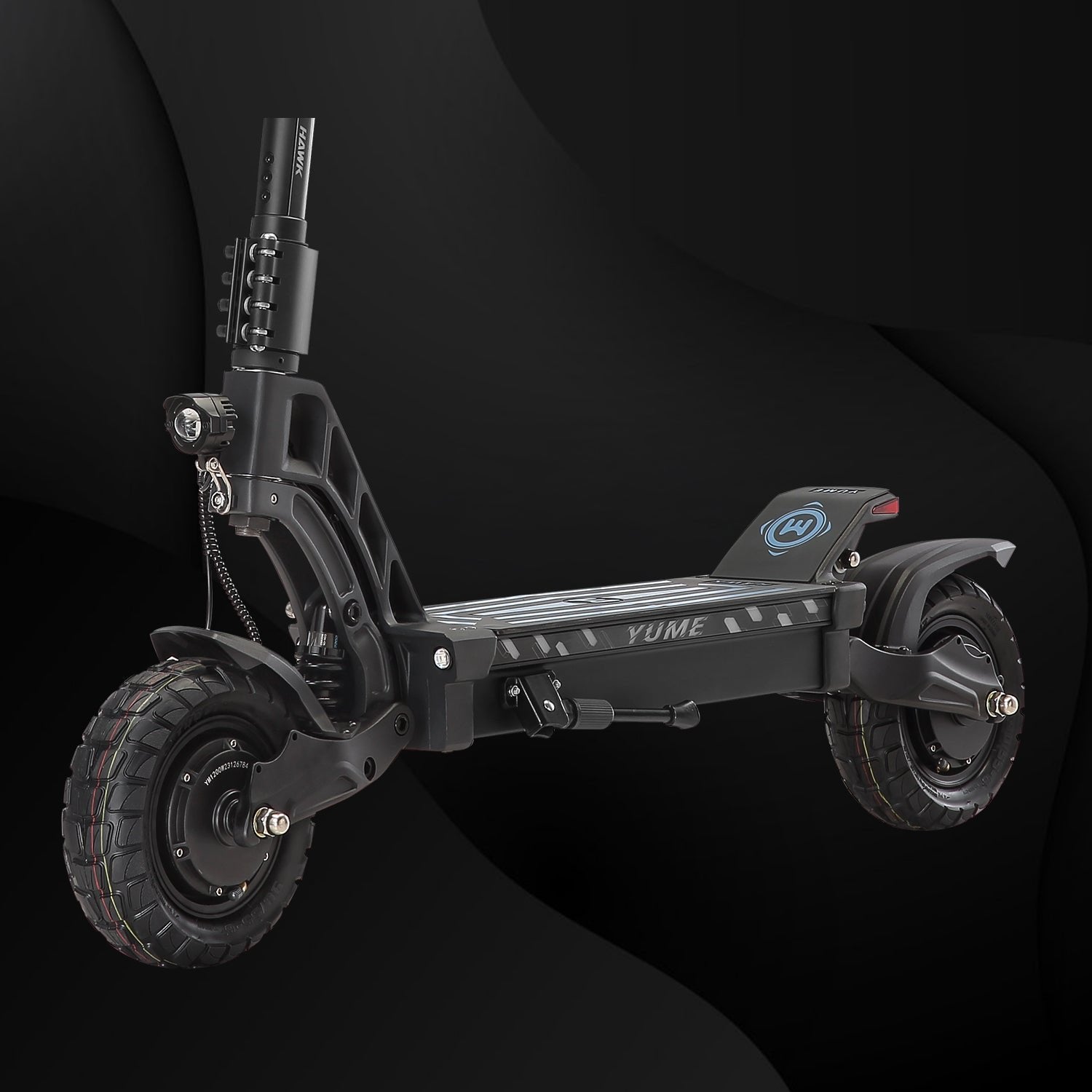 Black scooter with visible branding on a dark background