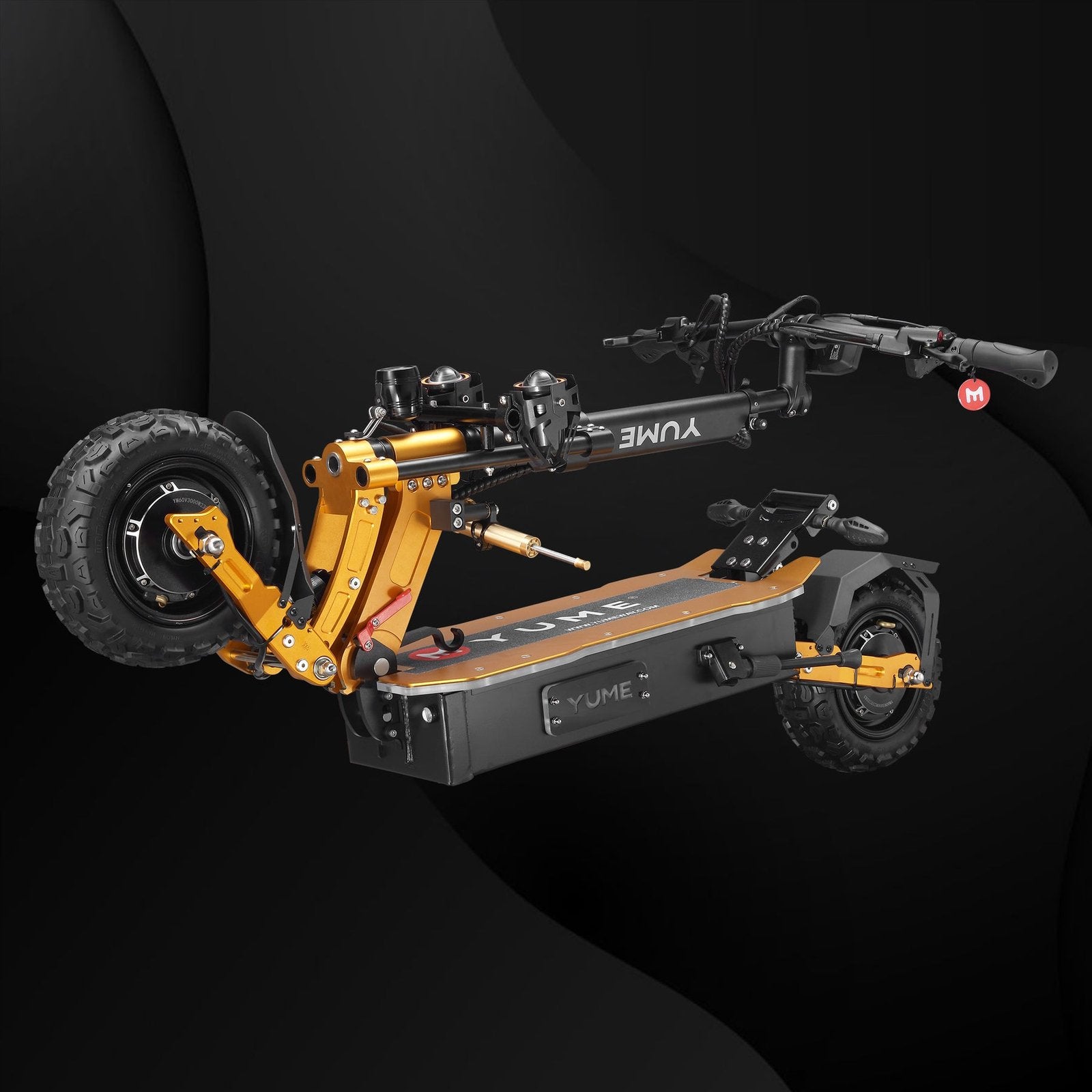 Yume electric scooter with yellow frame and black deck on a dark background