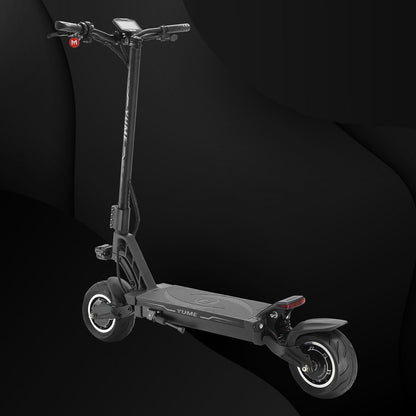 Black electric scooter on a dark background
