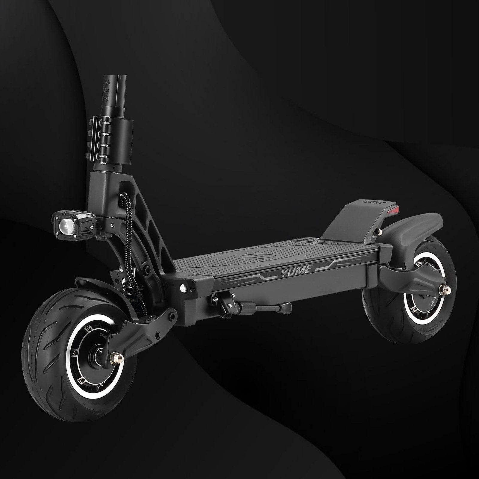 Black electric scooter with 'Yume' branding on a dark background