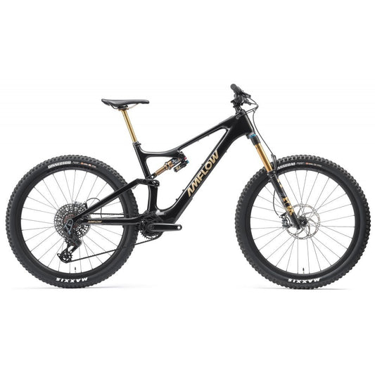 Black e-bike with gold accents on a white background