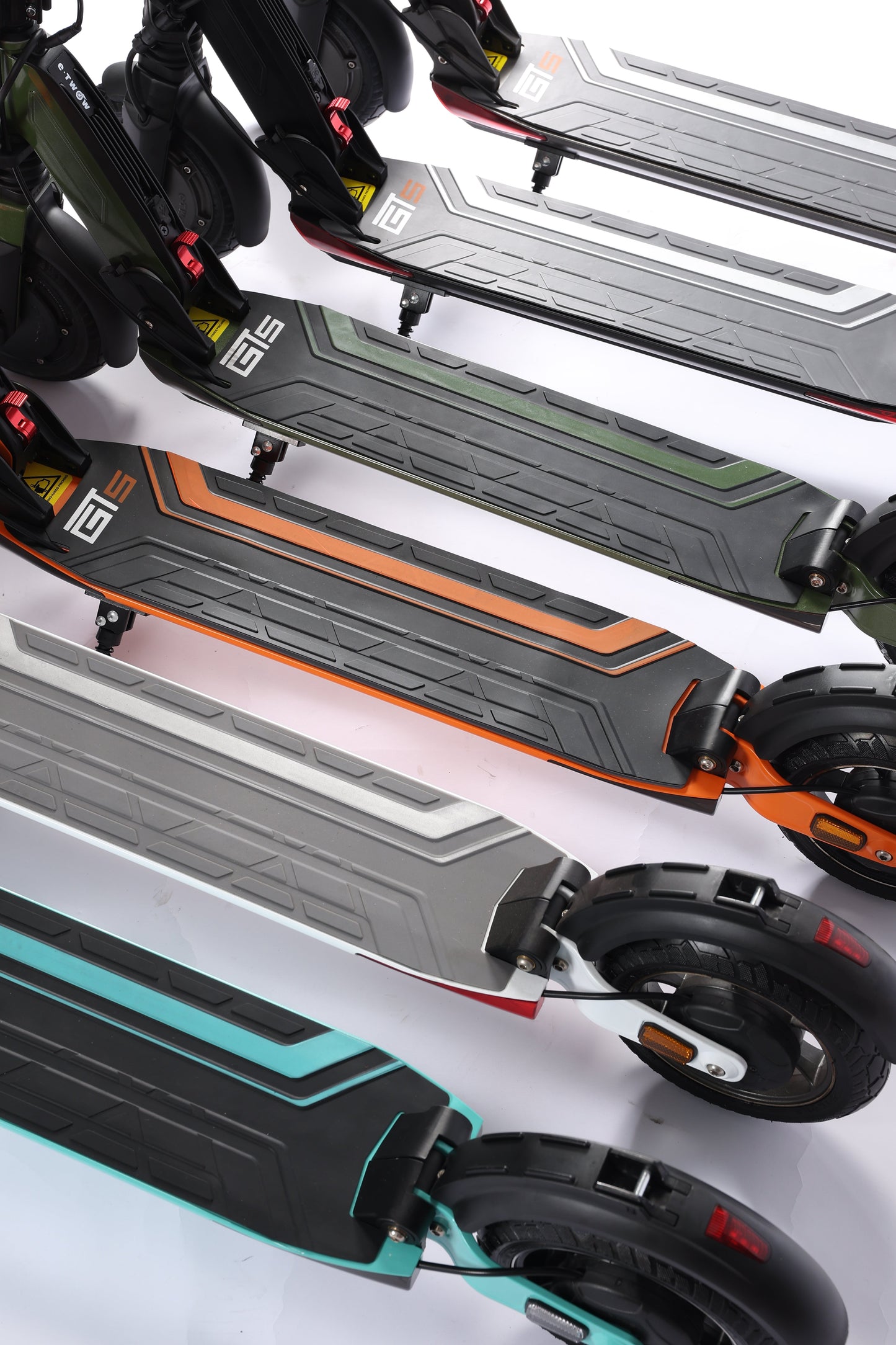 Row of electric scooters with different color options on a white background