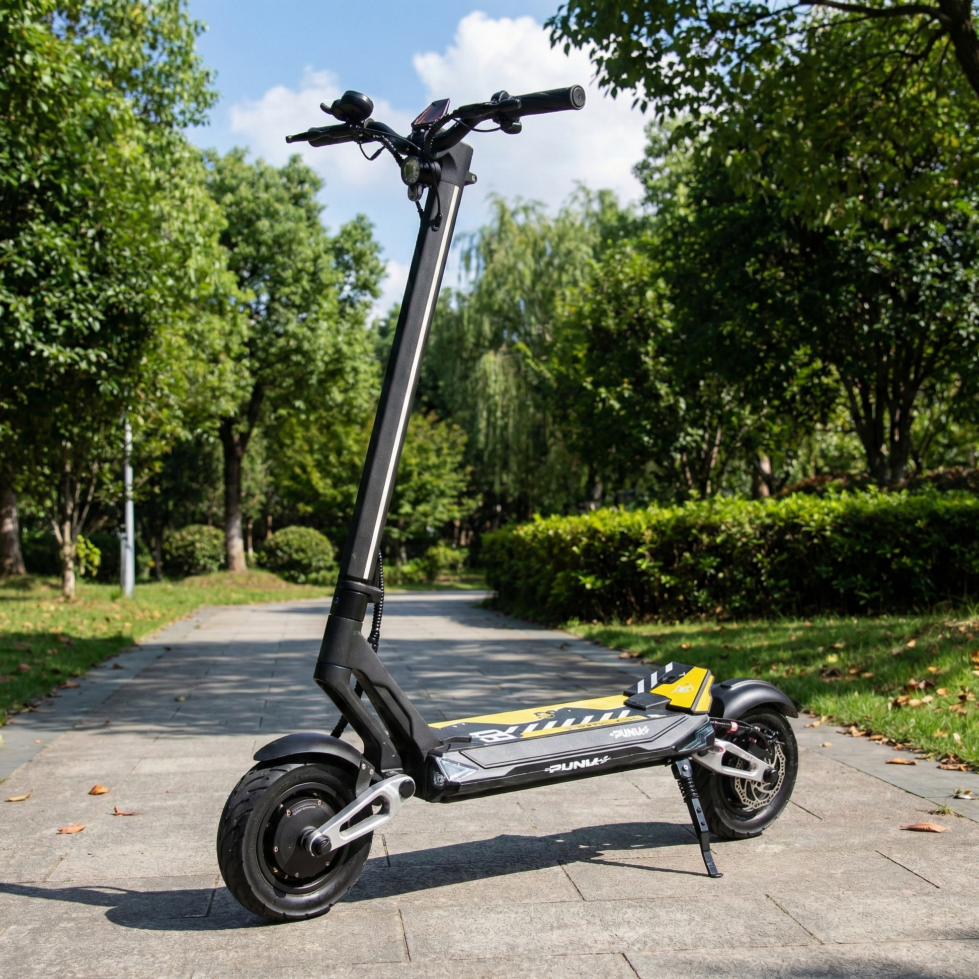 Electric scooter on a paved path with greenery in the background