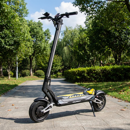 Electric scooter on a paved path with greenery in the background