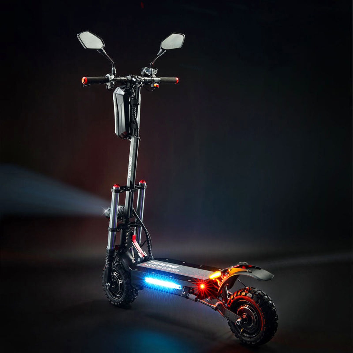 Teewing X4 electric scooter lit at night with deck LEDs on